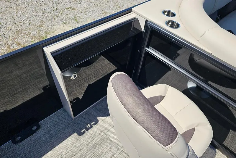 Slide: The Image of 2026 Bentley Pontoons Fish 240 4-Point interior with seating and cup holders. - 13