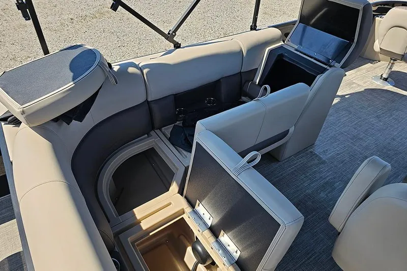 Slide: The Image of 2026 Bentley Pontoons Fish 240 4-Point interior with storage compartments and seating. - 17