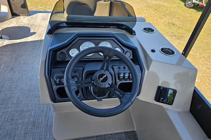 Slide: The Image of Steering console of 2026 Bentley Pontoons Fish 240 4-Point with gauges and controls. - 20