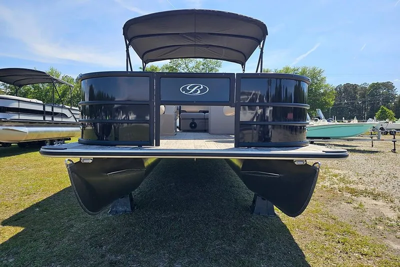 Slide: The Image of 2026 Bentley Pontoons Fish 240 4-Point pontoon boat displayed outdoors. - 5