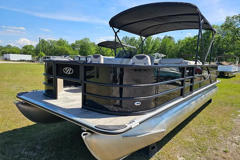 Slide: The Image of 2026 Bentley Pontoons Fish 240 4-Point pontoon boat on grassy area. - 6