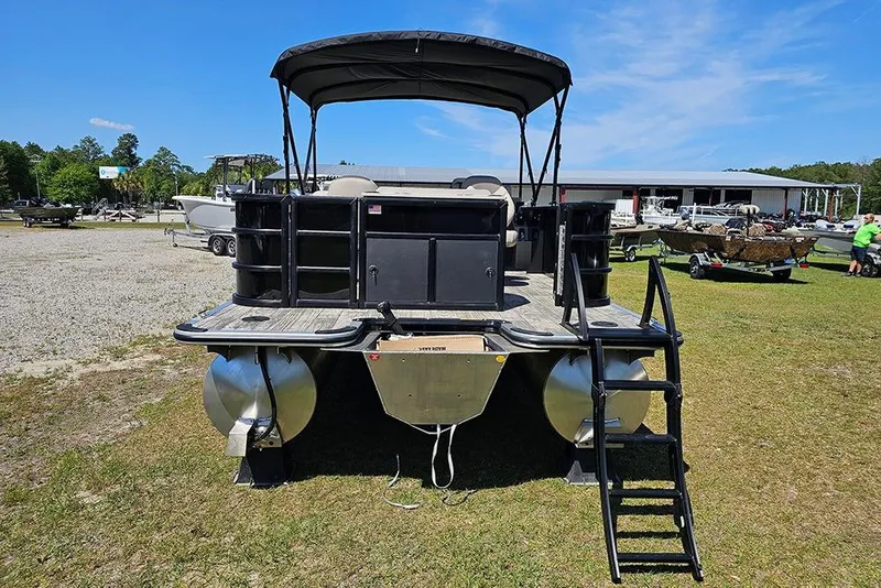 Slide: The Image of 2026 Bentley Pontoons Fish 240 4-Point pontoon boat displayed outdoors. - 9