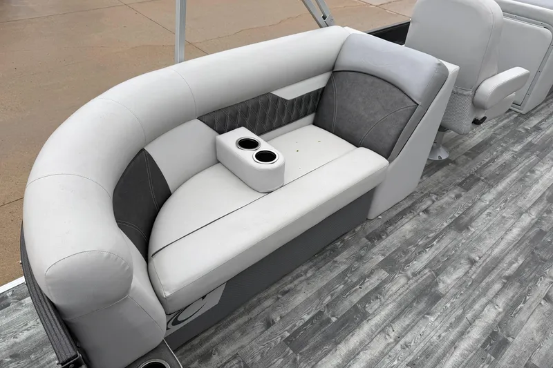 Slide: The Image of 2019 Crest II SLC LTD boat interior with gray seating and cup holders. - 17