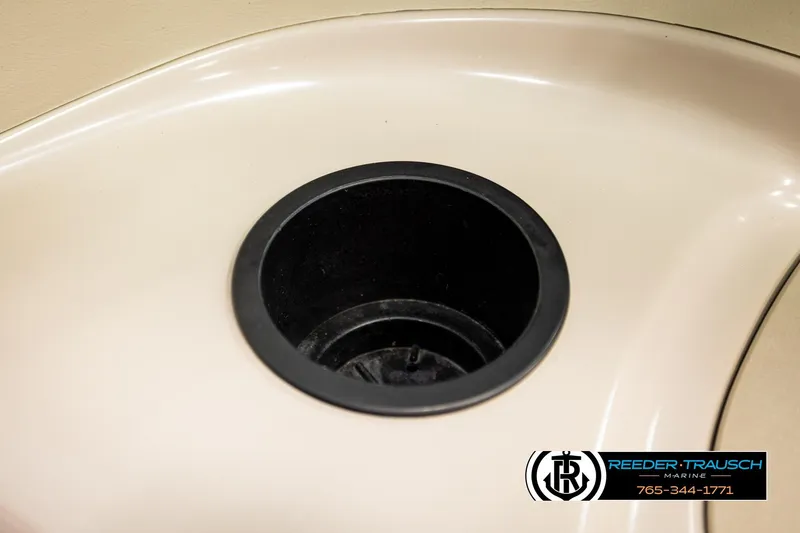 Slide: The Image of Cup holder on 2003 Sea Ray 200 Bow Rider boat interior. - 32