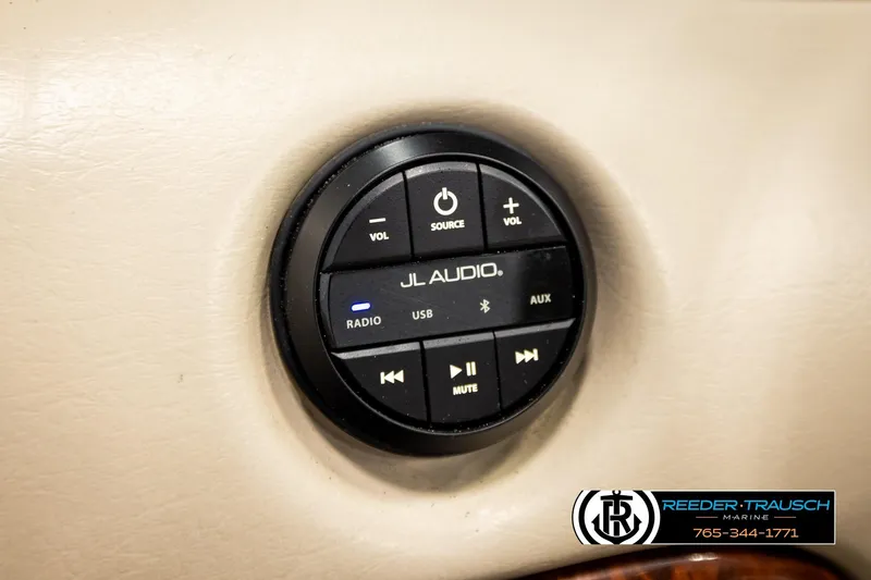 Slide: The Image of JL Audio control panel on 2003 Sea Ray 200 Bow Rider boat dashboard. - 36