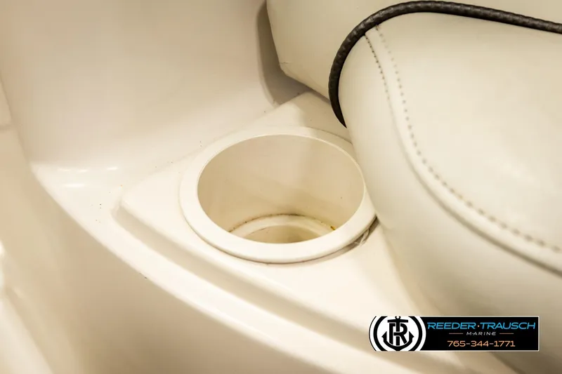 Slide: The Image of Cup holder and seat detail on 2003 Sea Ray 200 Bow Rider boat. - 46