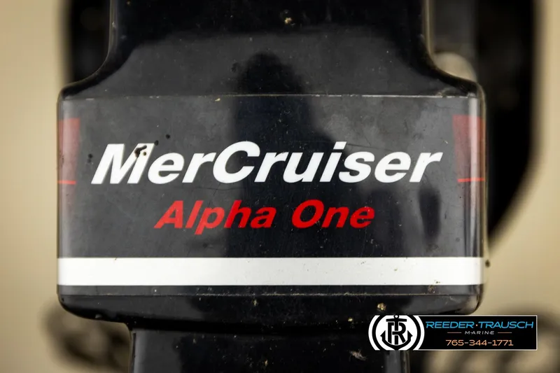 Slide: The Image of MerCruiser Alpha One engine detail on 2003 Sea Ray 200 Bow Rider boat. - 56