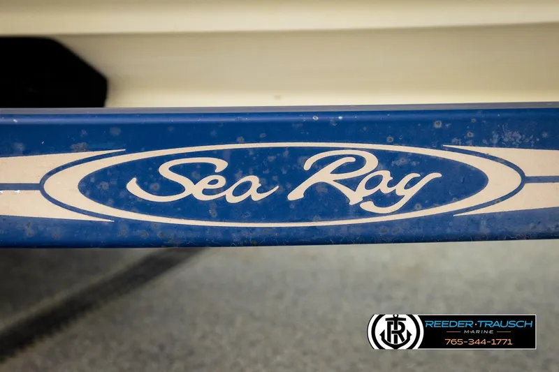 Slide: The Image of Sea Ray 2003 200 Bow Rider logo on blue background, Reeder-Trausch Marine branding. - 58