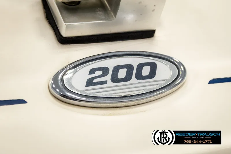 Slide: The Image of Sea Ray 200 Bow Rider emblem, 2003 model, with Reeder-Trausch Marine logo. - 60