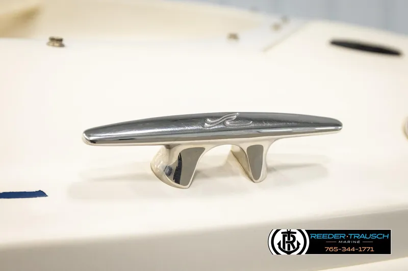 Slide: The Image of Chrome cleat on 2003 Sea Ray 200 Bow Rider boat deck. - 62
