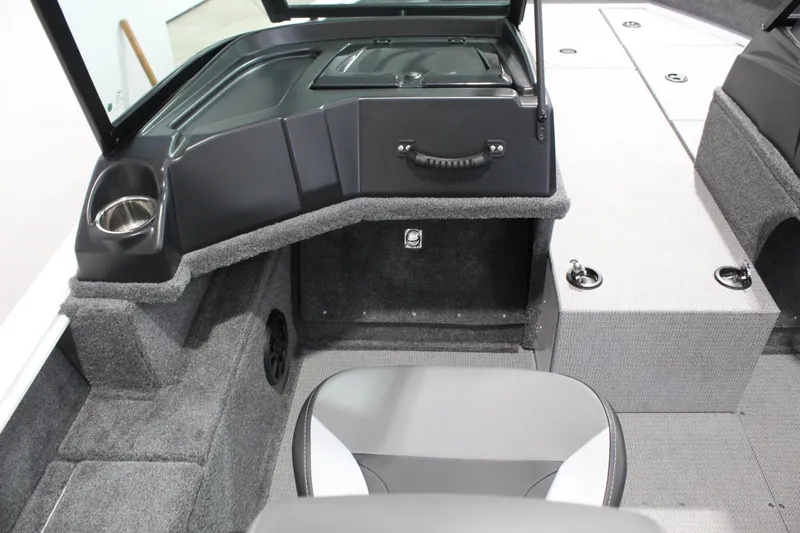 Slide: The Image of 2026 G3 Angler V18 FS boat interior with seating, storage, and cup holder. - 6