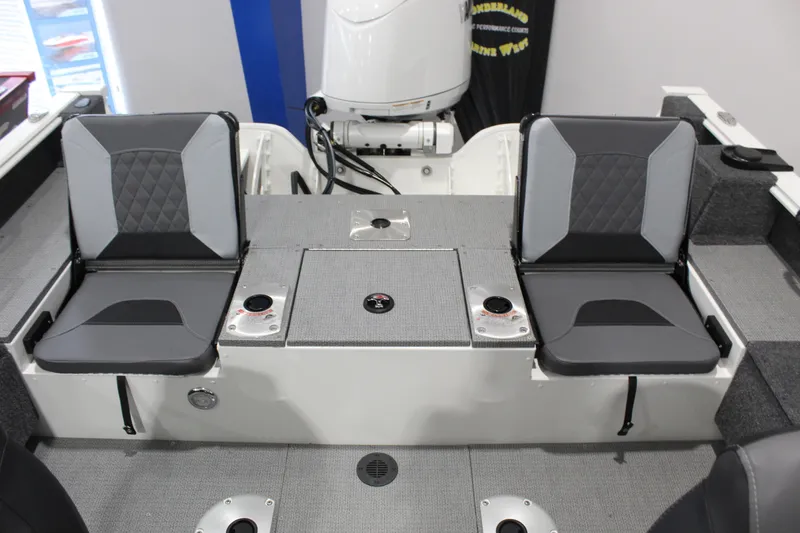 Slide: The Image of Interior of 2026 G3 Angler V18 FS boat featuring dual seats and storage compartments. - 9