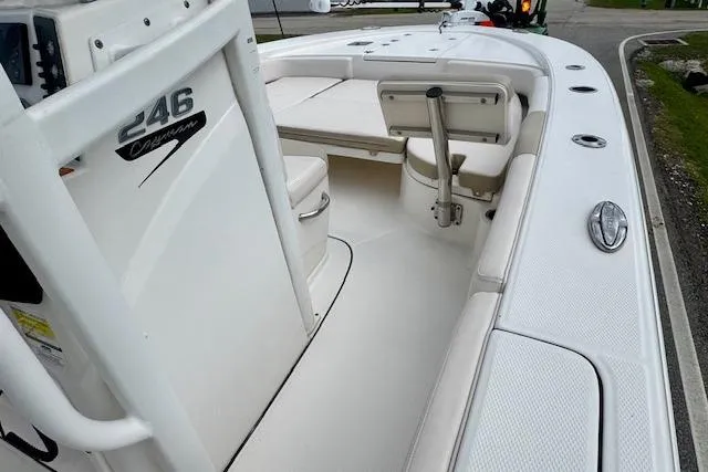 Slide: The Image of 2017 Robalo 246 Cayman boat interior with seating and storage compartments. - 14