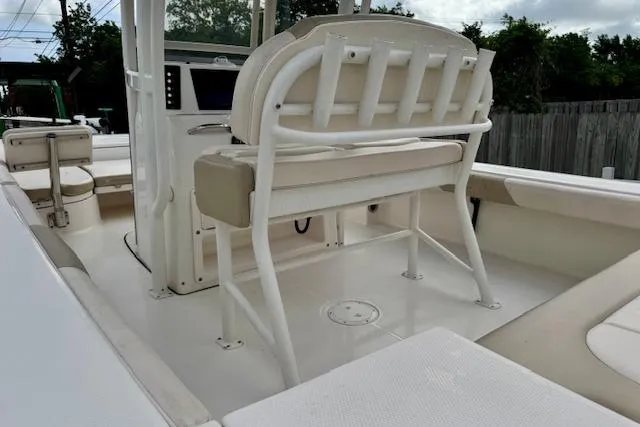 Slide: The Image of 2017 Robalo 246 Cayman boat interior with seating and console. - 8