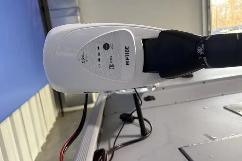 Slide: The Image of 2026 Tracker Bass Tracker Classic CC with Riptide trolling motor, close-up view. - 8