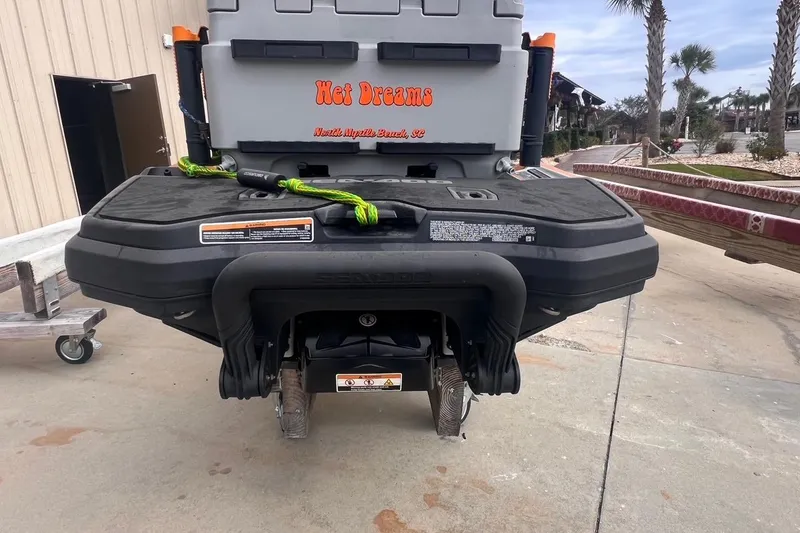 Slide: The Image of 2022 Sea-Doo FishPro Sport 170 rear view with storage box and accessories. - 3