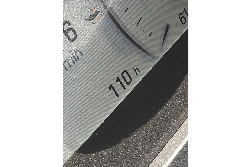 Slide: The Image of Close-up of Sea-Doo FishPro Sport 170 gauge showing 110 hours usage. - 6