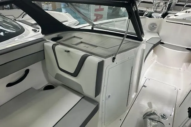Slide: The Image of 2025 Yamaha Boats AR220 interior with sleek seating and modern design features. - 10
