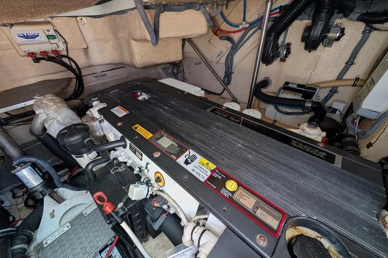 Slide: The Image of Engine room of a 2008 Formula 40 Performance Cruiser with visible components and wiring. - 29