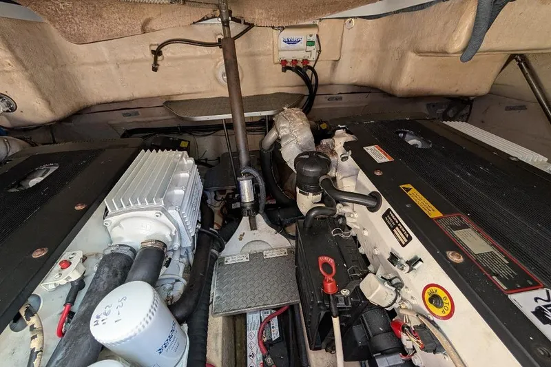 Slide: The Image of Engine compartment of a 2008 Formula 40 Performance Cruiser, showcasing mechanical components. - 30