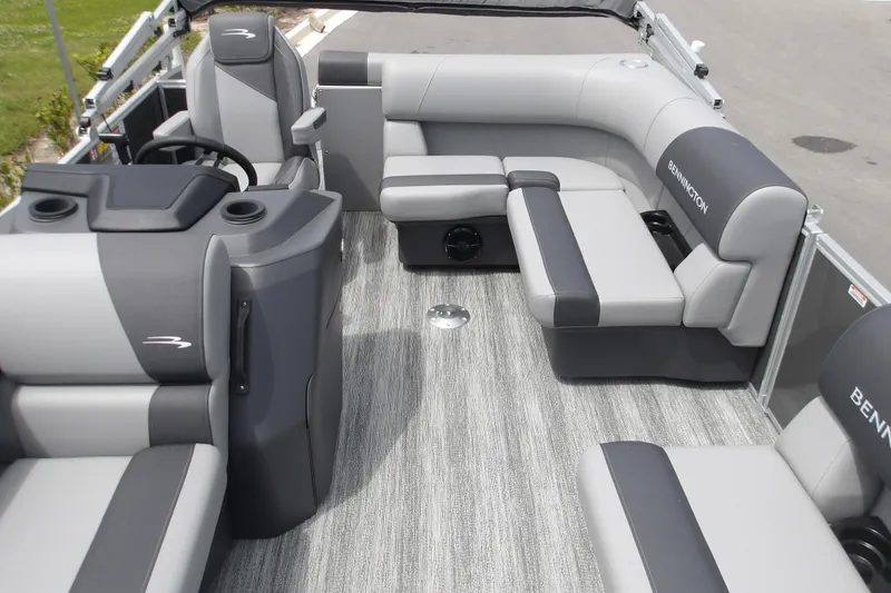 Slide: The Image of 2026 Bennington 16 S L-Bench pontoon boat interior with gray seating and modern design. - 9