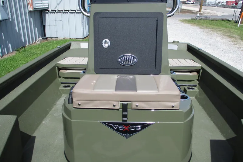 Slide: The Image of 2026 Vexus Defender 201 boat interior with seating and storage compartments. - 10