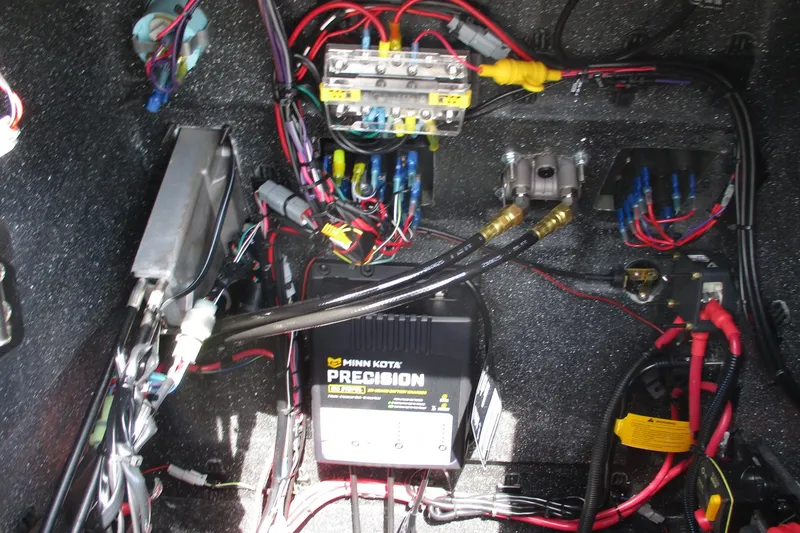 Slide: The Image of Electrical wiring and components inside a 2026 Vexus Defender 201 boat. - 14