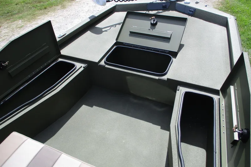 Slide: The Image of 2026 Vexus Defender 201 boat interior with open storage compartments. - 4