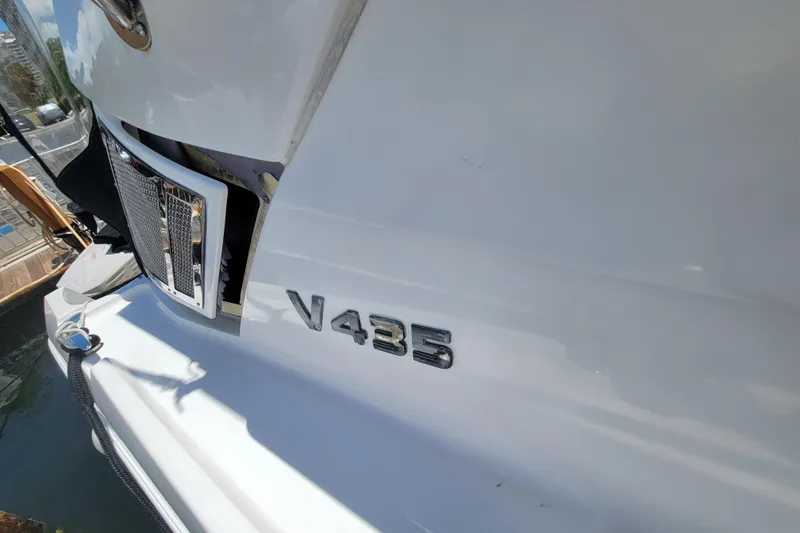 Slide: The Image of 2012 Four Winns V435 boat exterior with model emblem. - 37