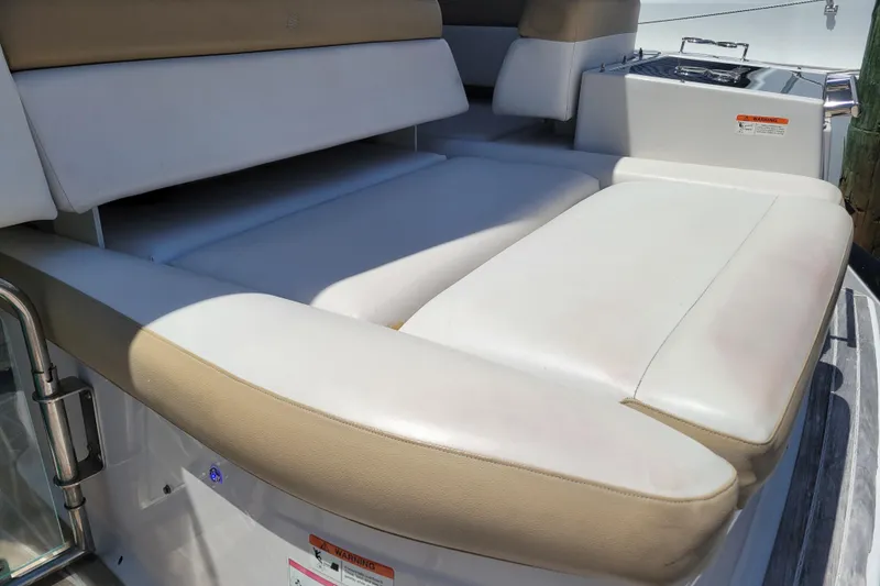 Slide: The Image of Luxurious seating on 2012 Four Winns V435 yacht, featuring plush white upholstery. - 46