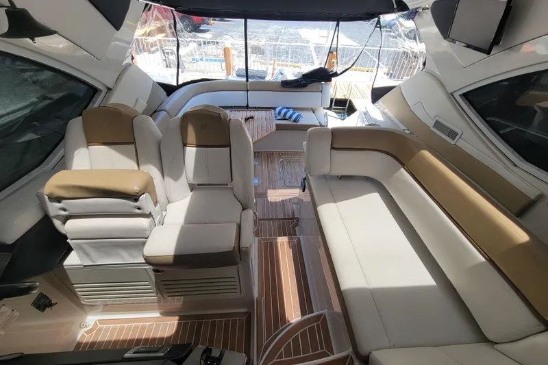 Slide: The Image of Luxurious interior of 2012 Four Winns V435 yacht with plush seating and elegant design. - 56