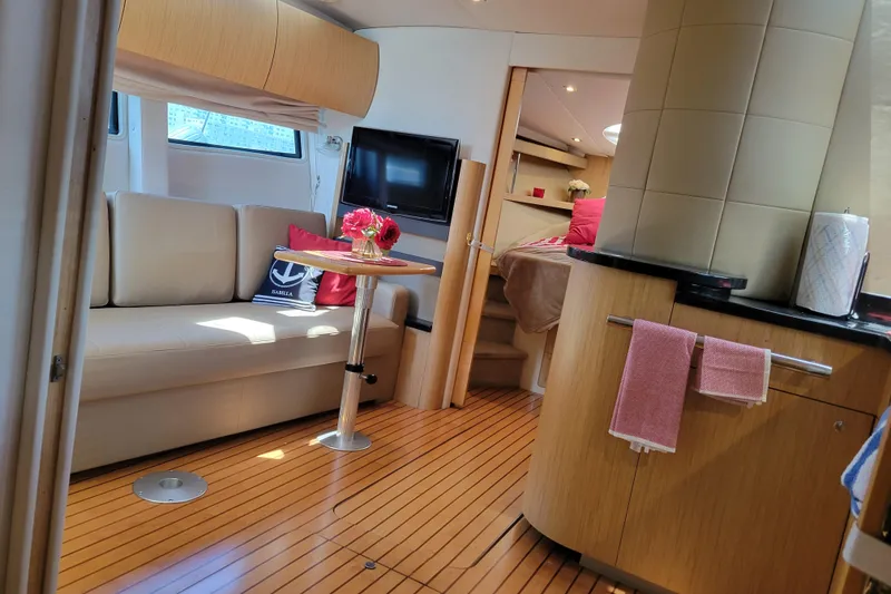 Slide: The Image of Luxurious interior of 2012 Four Winns V435 yacht with modern furnishings and elegant decor. - 68