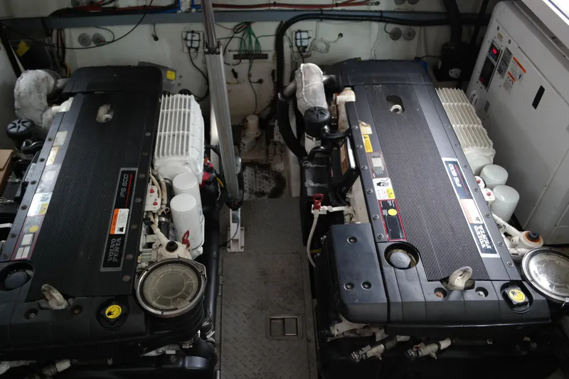 Slide: The Image of Engine room of a 2012 Four Winns V435 boat with Volvo Penta engines. - 80