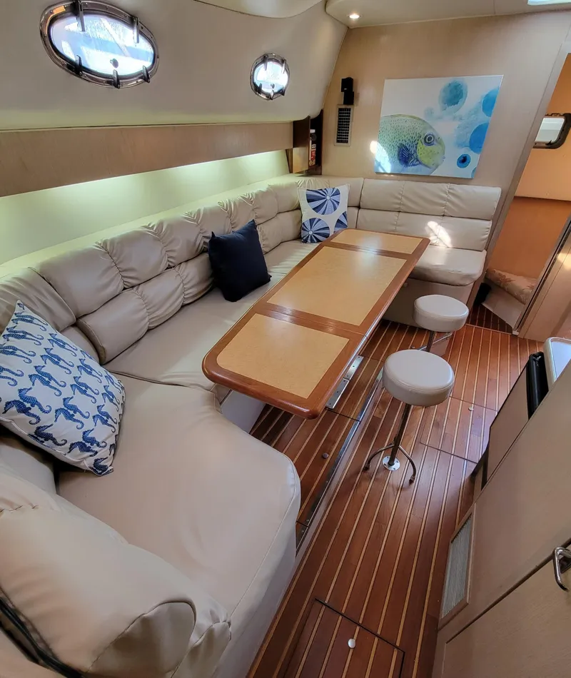 Slide: The Image of Salon Starboard Aft - Seating for 8 Adults - 17
