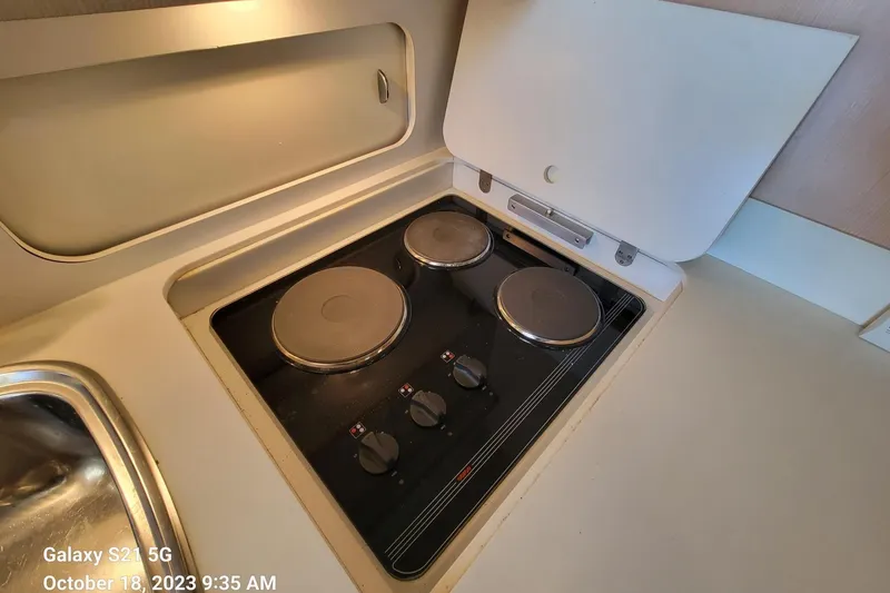 Slide: The Image of Galley - Three Burner Stove Top - 21