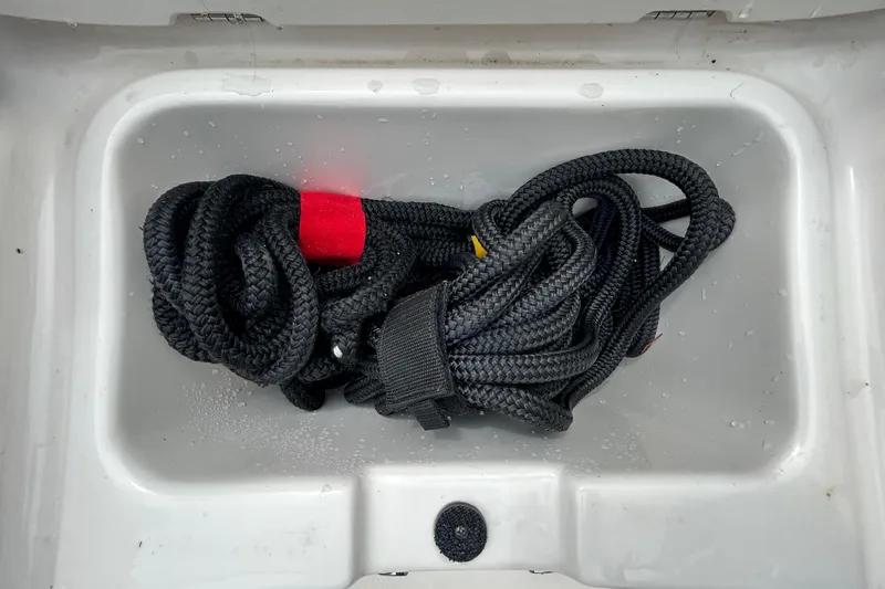 Slide: The Image of 2020 Chaparral 230 Suncoast boat seating area with white cushion. - 106