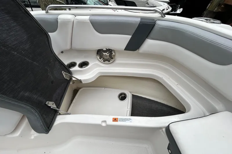 Slide: The Image of 2020 Chaparral 230 Suncoast boat deck with chrome winch detail. - 113