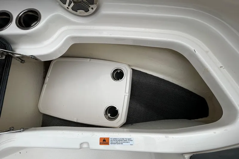 Slide: The Image of 2020 Chaparral 230 Suncoast boat deck with metal hatch detail. - 114