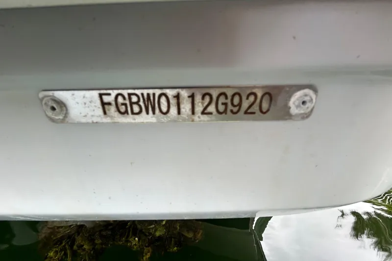 Slide: The Image of 2020 Chaparral 230 Suncoast boat hull identification number plate. - 115