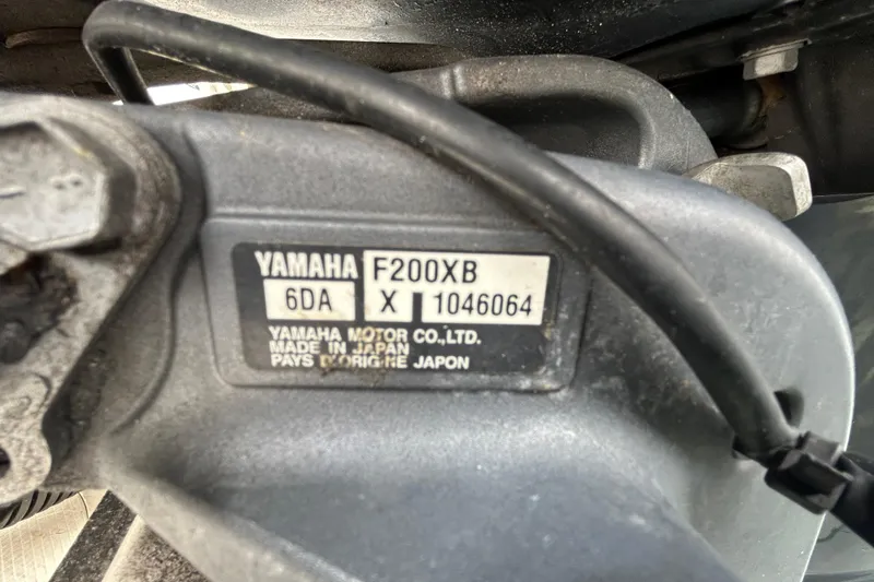 Slide: The Image of Yamaha F200XB engine label on 2020 Chaparral 230 Suncoast boat, made in Japan. - 116