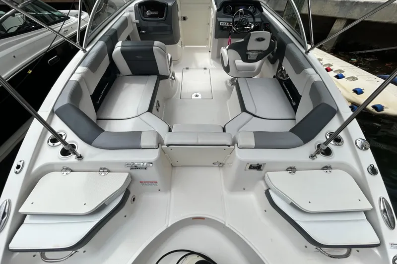 Slide: The Image of 2020 Chaparral 230 Suncoast boat interior with spacious seating and modern design. - 18