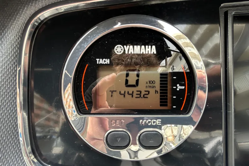 Slide: The Image of Yamaha tachometer displaying 443.2 hours on a 2020 Chaparral 230 Suncoast boat. - 28