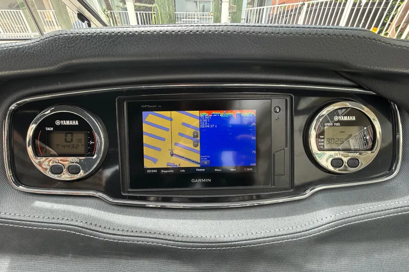 Slide: The Image of Dashboard of 2020 Chaparral 230 Suncoast with Garmin GPS and Yamaha gauges. - 29