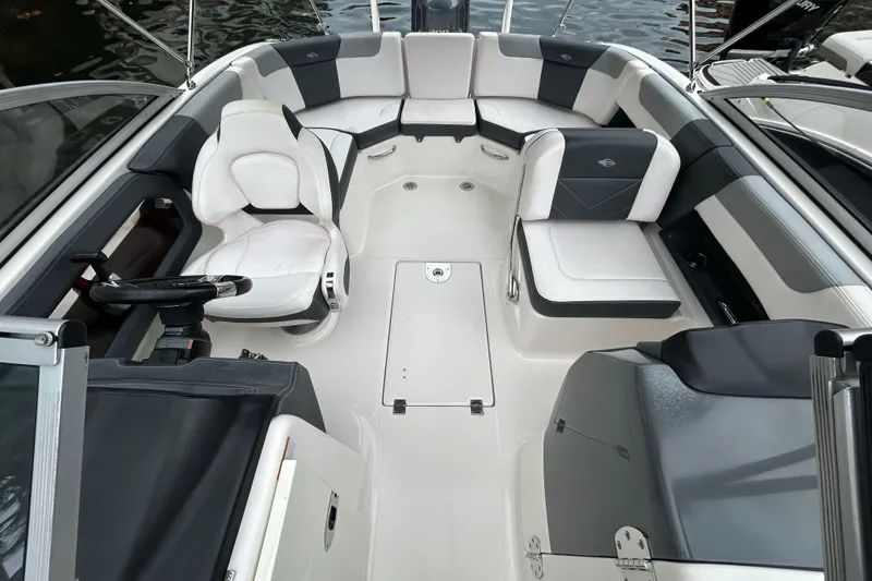 Slide: The Image of 2020 Chaparral 230 Suncoast boat interior with sleek seating and modern design. - 44