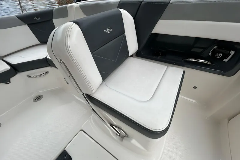Slide: The Image of 2020 Chaparral 230 Suncoast boat interior with sleek seating and modern design. - 86
