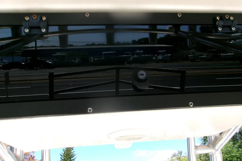 Slide: The Image of 2020 Key West 203 FS boat dashboard with street reflection. - 13