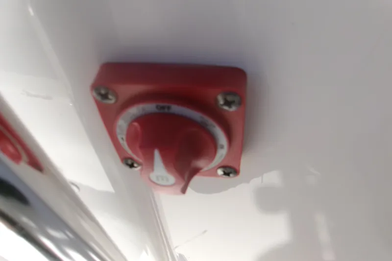 Slide: The Image of Red battery switch on a 2020 Key West 203 FS boat. - 18