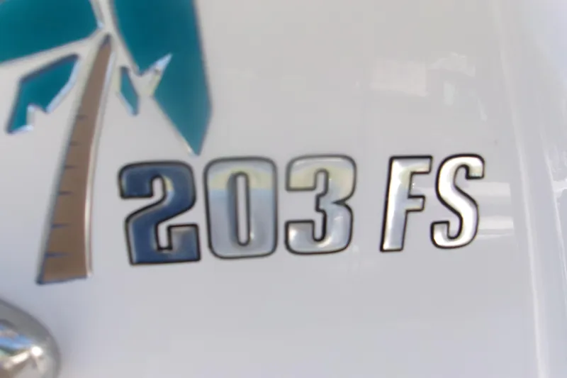 Slide: The Image of Key West 203 FS 2020 model emblem with palm tree design. - 19