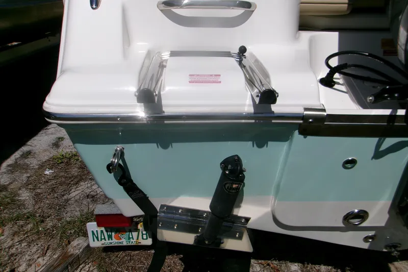 Slide: The Image of 2020 Key West 203 FS boat stern with ladder and Florida license plate. - 5