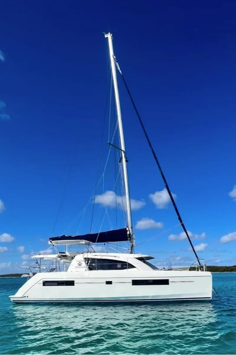 Slide: The Image of Leopard 40 catamaran 2018 on calm waters under blue sky. - 14